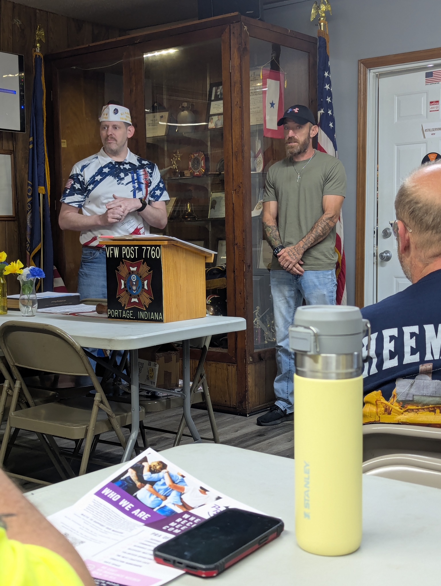 Commander Adam Ferguson and guest Mark Sumler address Post 7760 members